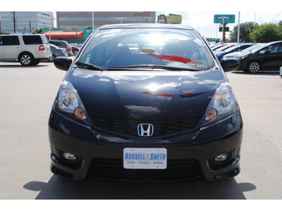 honda fit 2012 black hatchback sport gasoline 4 cylinders front wheel drive 5 speed manual 77025