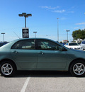 toyota corolla 2006 lt  green sedan le gasoline 4 cylinders front wheel drive automatic with overdrive 76011
