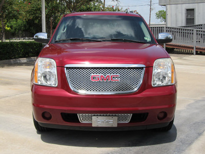 gmc yukon 2007 red suv sle gasoline 8 cylinders rear wheel drive automatic with overdrive 77074