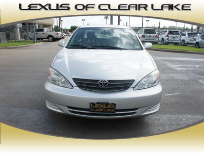 toyota camry 2004 silver sedan le gasoline 4 cylinders front wheel drive automatic 77546