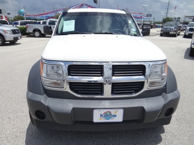 dodge nitro 2008 white suv sxt gasoline 6 cylinders rear wheel drive not specified 77388