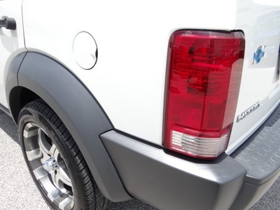 dodge nitro 2008 white suv sxt gasoline 6 cylinders rear wheel drive not specified 77388