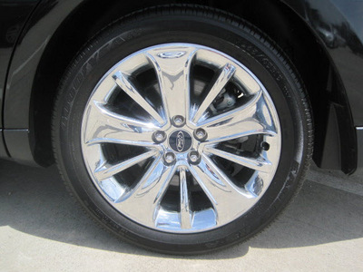 ford taurus 2011 black sedan gasoline 6 cylinders front wheel drive automatic 77578