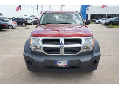dodge nitro 2007 red suv sxt gasoline 6 cylinders rear wheel drive automatic 77034