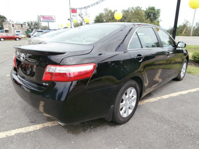 toyota camry 2009 black sedan gasoline 4 cylinders front wheel drive automatic 13502