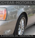 cadillac deville 2000 brown sedan gasoline 8 cylinders front wheel drive automatic 77008