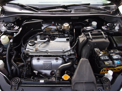 mitsubishi lancer 2003 black sedan ls gasoline 4 cylinders sohc front wheel drive automatic 76011