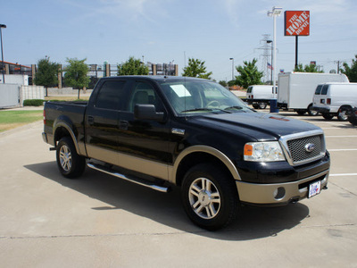 ford f 150 2006 black lariat gasoline 8 cylinders 4 wheel drive automatic with overdrive 76108