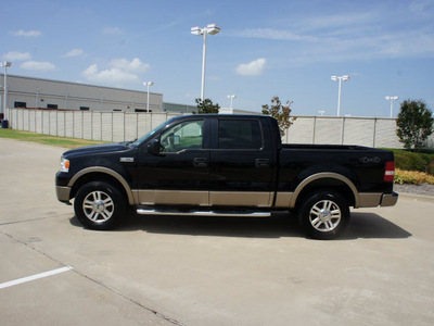 ford f 150 2006 black lariat gasoline 8 cylinders 4 wheel drive automatic with overdrive 76108