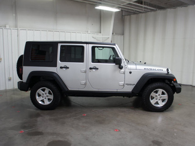jeep wrangler unlimited 2010 silver suv rubicon gasoline 6 cylinders 4 wheel drive automatic with overdrive 76108