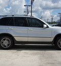 bmw x5 2004 silver suv 4 4i gasoline 8 cylinders all whee drive automatic 77090