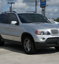bmw x5 2004 silver suv 4 4i gasoline 8 cylinders all whee drive automatic 77090