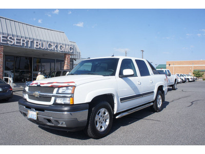 chevrolet avalanche 2005 white 1500 lt flex fuel 8 cylinders 4 wheel drive automatic 99336