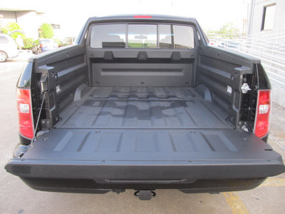 honda ridgeline 2010 black pickup truck rtl w navi gasoline 6 cylinders 4 wheel drive automatic with overdrive 77074