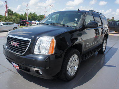 gmc yukon 2009 black suv slt gasoline 8 cylinders 2 wheel drive shiftable automatic 77338