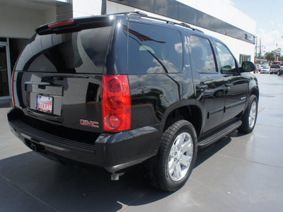 gmc yukon 2009 black suv slt gasoline 8 cylinders 2 wheel drive shiftable automatic 77338