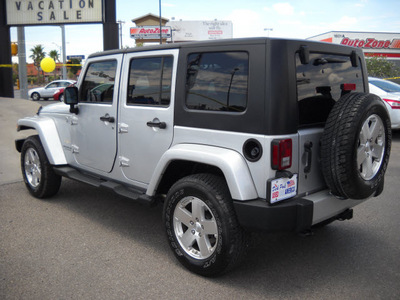 jeep wrangler unlimited 2010 silver suv sahara gasoline 6 cylinders 4 wheel drive automatic 79925