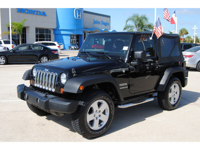 jeep wrangler 2011 black suv sport gasoline 6 cylinders 4 wheel drive 6 speed manual 77065