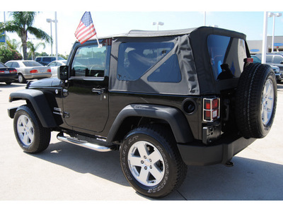 jeep wrangler 2011 black suv sport gasoline 6 cylinders 4 wheel drive 6 speed manual 77065