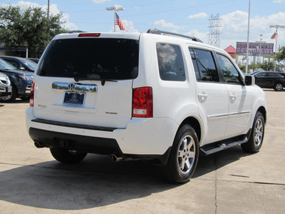honda pilot 2009 white suv touring w navi w dvd gasoline 6 cylinders front wheel drive automatic with overdrive 77074