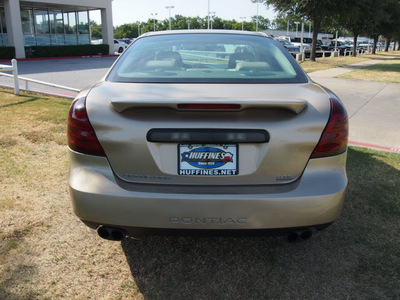 pontiac grand prix 2005 beige sedan gtp gasoline 6 cylinders front wheel drive automatic 75067