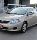 toyota corolla 2010 tan sedan le gasoline 4 cylinders front wheel drive automatic with overdrive 77074