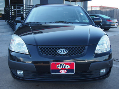 kia rio5 2006 black hatchback sx gasoline 4 cylinders front wheel drive automatic 77034