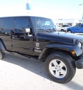 jeep wrangler unlimited 2007 black suv sahara gasoline 6 cylinders 4 wheel drive automatic 77388