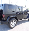 jeep wrangler unlimited 2007 black suv sahara gasoline 6 cylinders 4 wheel drive automatic 77388