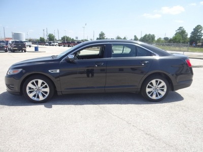ford taurus 2010 black sedan limited gasoline 6 cylinders front wheel drive shiftable automatic 77388