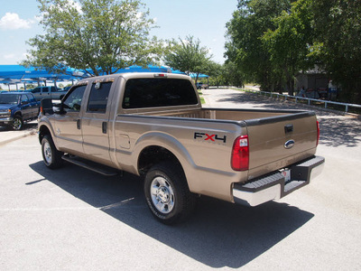 ford f 250 super duty 2011 brown xlt biodiesel 8 cylinders 4 wheel drive automatic 76049