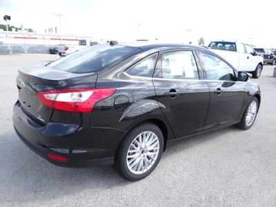 ford focus 2012 black sedan sel flex fuel 4 cylinders front wheel drive 6 speed automatic 77388