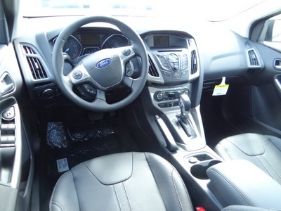 ford focus 2012 black sedan sel flex fuel 4 cylinders front wheel drive 6 speed automatic 77388