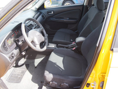 nissan sentra 2006 yellow sedan 1 8 s gasoline 4 cylinders front wheel drive automatic 77301