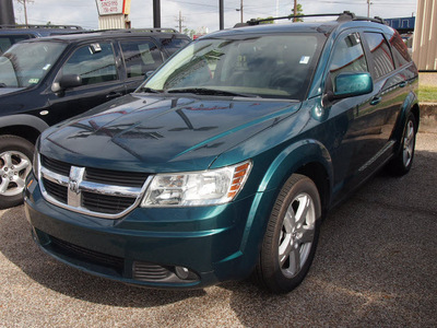 dodge journey 2009 dk  green suv sxt gasoline 6 cylinders front wheel drive automatic 77301