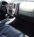 mercury mariner 2006 black suv premier gasoline 6 cylinders all whee drive automatic with overdrive 76011