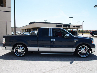 ford f 150 2005 blue xlt gasoline 8 cylinders rear wheel drive automatic with overdrive 76011