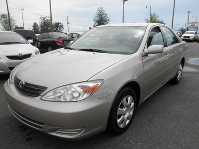 toyota camry 2004 gold sedan le gasoline 4 cylinders front wheel drive automatic 34788
