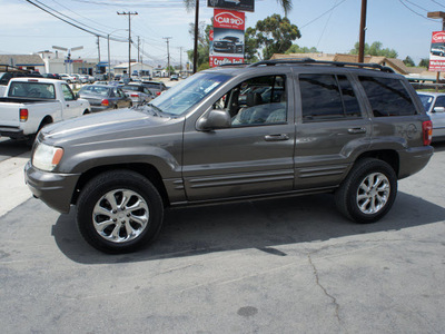 jeep grand cherokee 2000 silver suv limited gasoline 8 cylinders 4 wheel drive automatic 92882