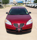 pontiac g6 2009 red sedan 4 cylinders automatic 76049