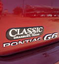 pontiac g6 2009 red sedan 4 cylinders automatic 76049