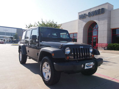 jeep wrangler unlimited 2011 black suv sport gasoline 6 cylinders 4 wheel drive automatic with overdrive 75093