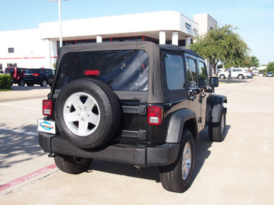 jeep wrangler unlimited 2011 black suv sport gasoline 6 cylinders 4 wheel drive automatic with overdrive 75093