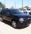 chevrolet tahoe 2011 black suv ls 8 cylinders automatic 76049