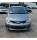 nissan versa 2011 dk  gray hatchback 1 8 sl gasoline 4 cylinders front wheel drive automatic with overdrive 77662