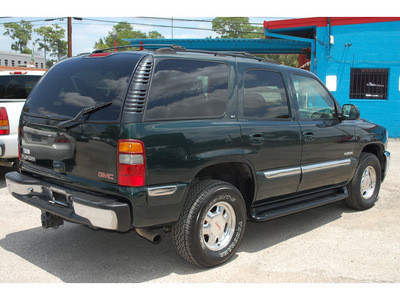 gmc yukon 2001 green suv slt gasoline 8 cylinders rear wheel drive automatic with overdrive 77018