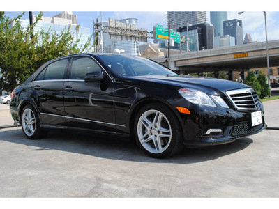 mercedes benz e class 2011 black sedan e550 luxury gasoline 8 cylinders rear wheel drive automatic 77002