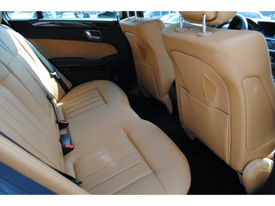 mercedes benz e class 2011 black sedan e550 luxury gasoline 8 cylinders rear wheel drive automatic 77002