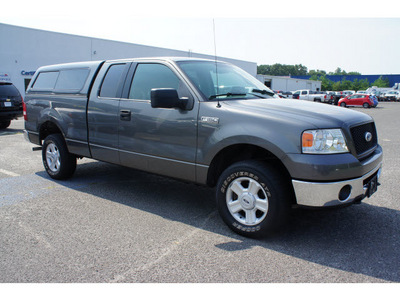 ford f 150 2006 dark shadow grey xlt gasoline 8 cylinders 4 wheel drive automatic with overdrive 07712