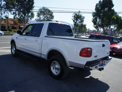 ford f 150 2001 off white lariat gasoline 8 cylinders 4 wheel drive automatic 92882